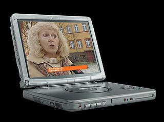 Fundstück-Header mit DVD-Player links und "Komm ich jetzt im Fernsehen?" rechts